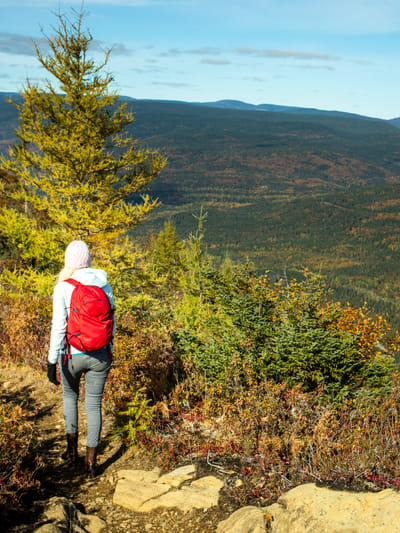 hiker-explores-a-scenic-mountain-trail-during-autumn